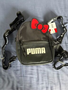 Puma Black Mini Backpack with Red Bow Accent